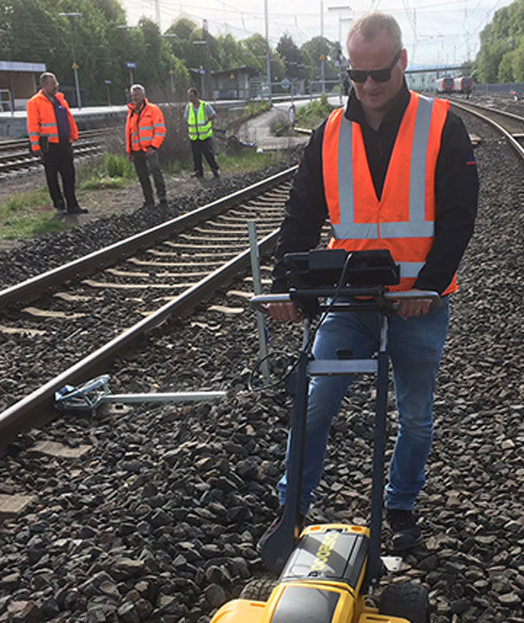 utilities surveyor reveals underground rails with detection radar Leica DS2000