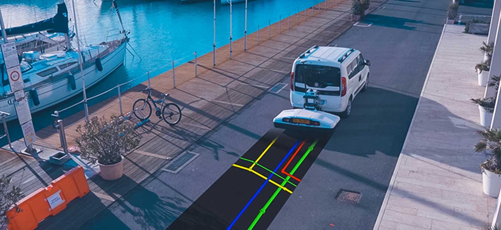 van pulling a utility detection and mapping instrument along a road with graphics of the underground utilities added