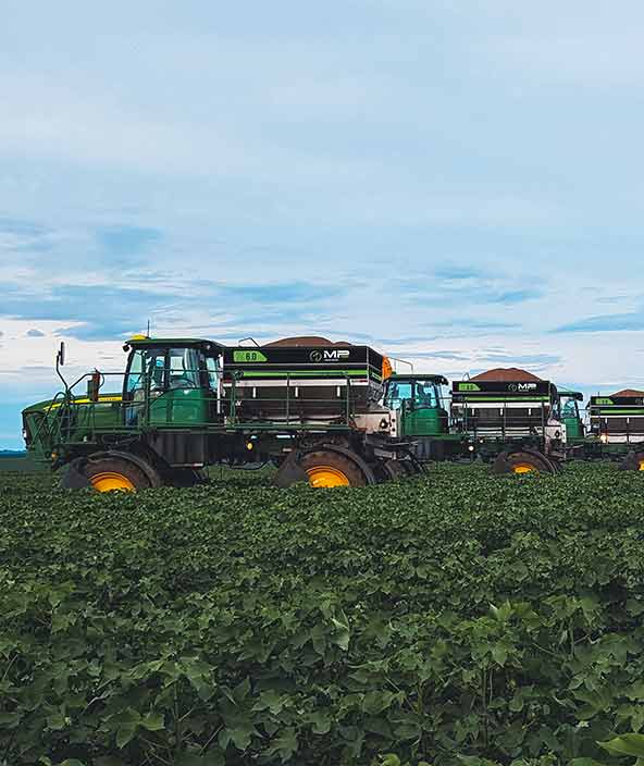 tractor with MP Agro fertiliser working in the field