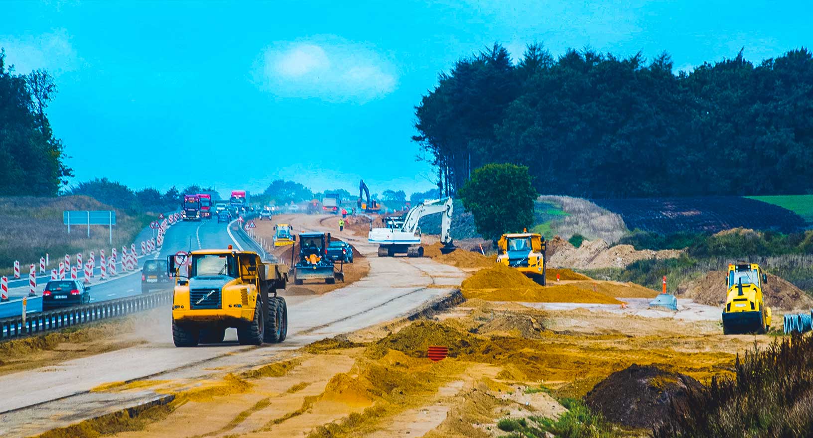 A construction site on the background. On the image’s bottom, the icons of heavy construction machines. 