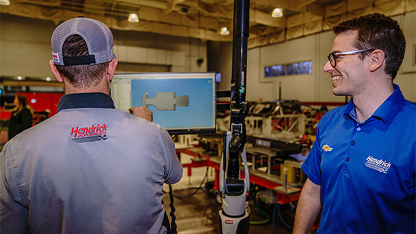 Figure 2. Bradley Johnson (Left) – Underwing Specialist working with an Absolute Arm with Roy Crump (Right) – Quality Control Supervisor